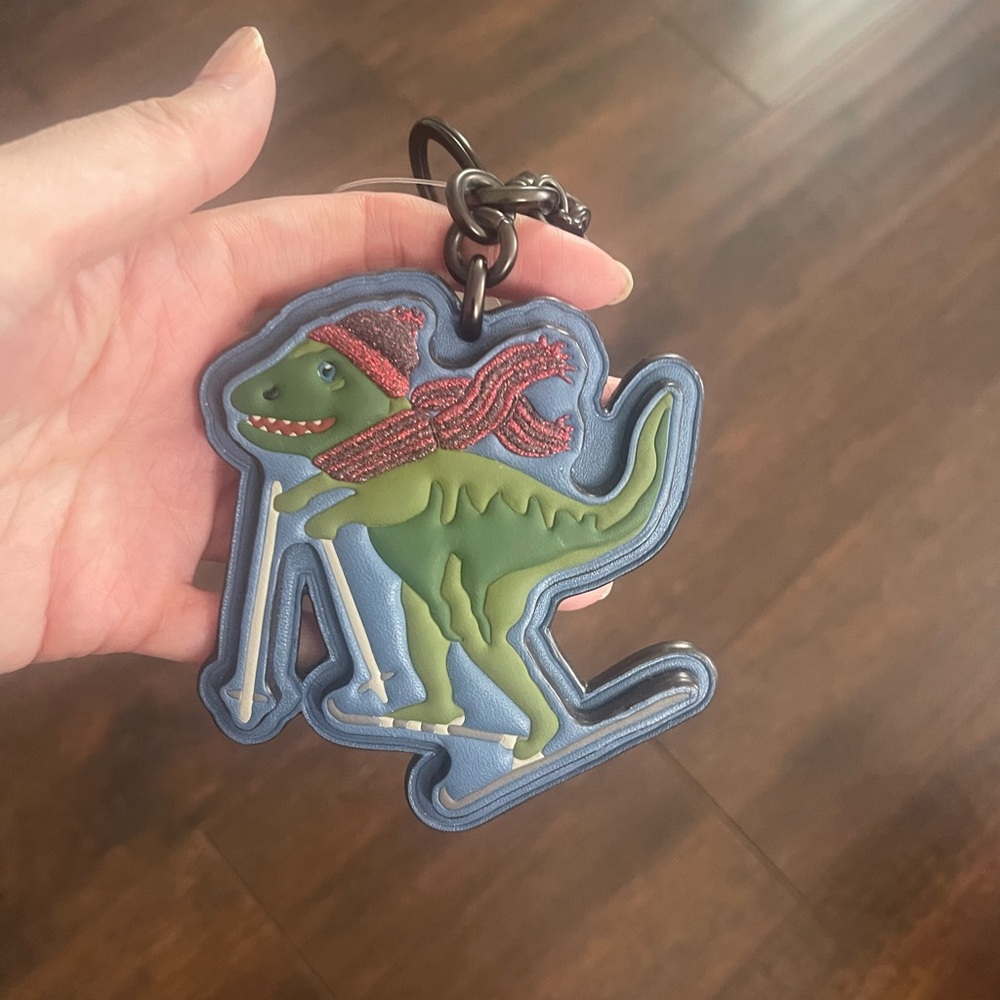 Coach Dinosaur Skiing Keychain